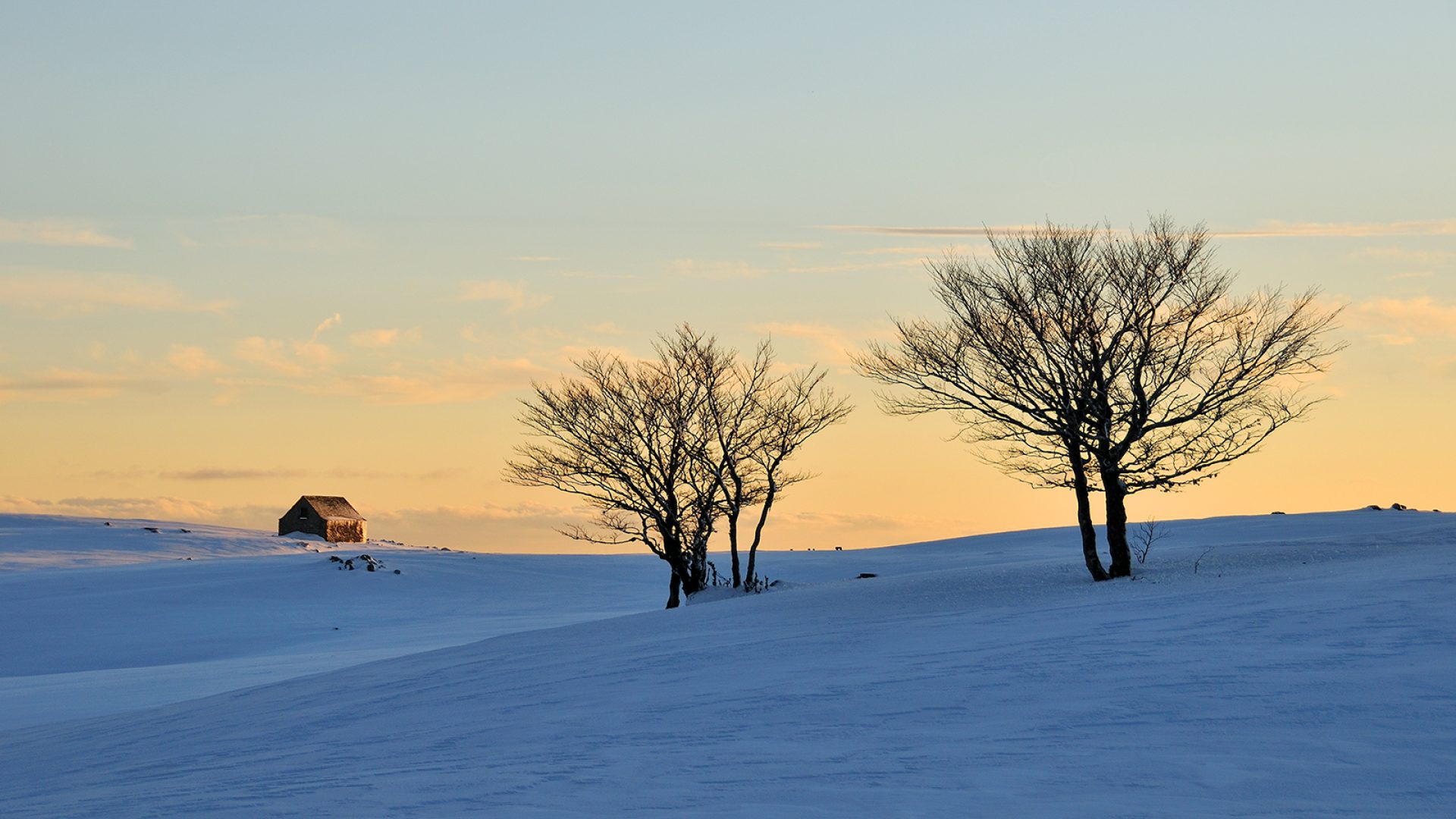 Neige coucher de soleil Aubrac