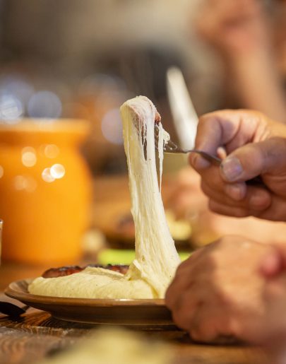 Eating an aligot from Aubrac